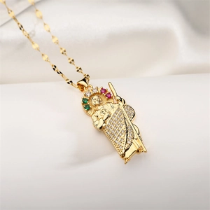 Close-up of 18K gold plated pendant with religious figure and colorful zircon crystals