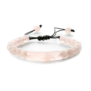 Natural rose quartz beaded bracelet with adjustable black braided rope on white background