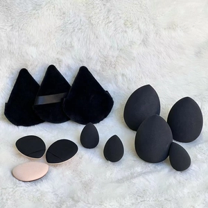 11-piece makeup sponge set with black beauty blenders and velvet powder puffs