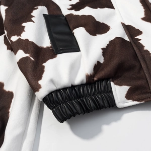 Winter tie-dye lapel jacket with cow pattern faux fur and black PU leather cuffs