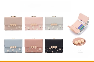 Floral print tri-fold wallet for women showing multiple colors and interior card slots