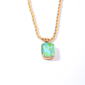 Vintage style gold twist rope chain necklace with rectangular emerald green gemstone pendant