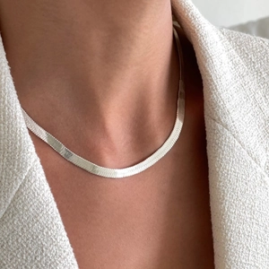 Minimalist 925 sterling silver 4mm herringbone chain necklace styled on a white tweed jacket