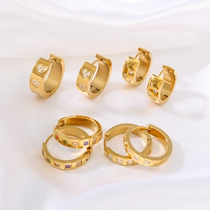 Set of four pairs of 18K gold-plated stainless steel hoop earrings with crystal charms