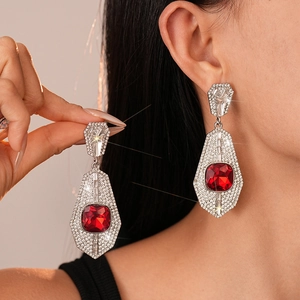 Vintage geometric drop earrings with large red crystals and sparkling rhinestones