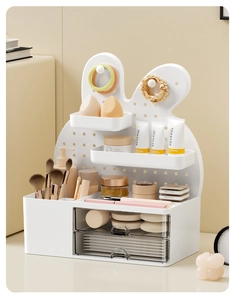 Close-up of cream bunny pegboard organizer with dual drawers and top compartments
