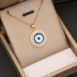 Vergoldete Evil Eye Halskette mit blauem Zirkonia in beiger Geschenkbox