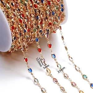 Detail of colorful crystal gems in gold plated chain with size 5x2.5mm for DIY jewelry