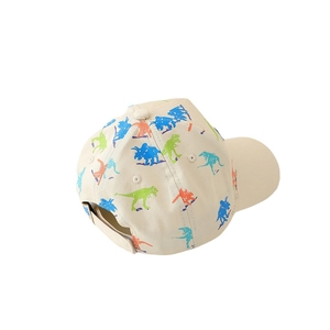 Kids dinosaur print baseball cap in beige cotton featuring a colorful dino pattern