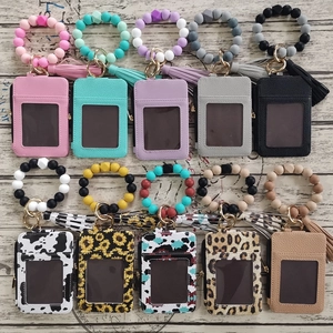 Various PU leather card holder sets with silicone bead bracelets and tassel charms