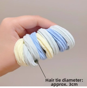 Detail showing high-elasticity seamless knitted hair ties with a 3cm diameter size marker