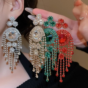 Close-up of geometric tassel drop earrings with sparkling rhinestones in multiple colors