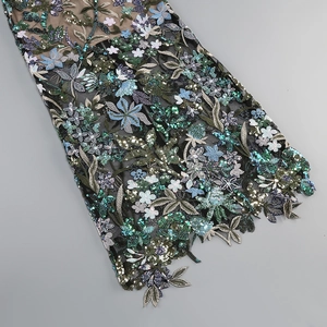 Detail of 3D floral embroidery with sequins on black mesh for sexy bodycon tube dress
