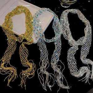 Selection of three luxury beaded mesh tassel necklaces in elegant gold and silver finishes.
