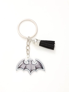 Detail of acrylic gray bat keychain with black tassel and silver metal chain