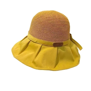 Women's yellow sun hat with straw top and wide canvas brim for outdoor sun protection
