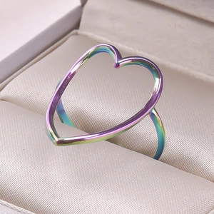 Macro detail of the rainbow heart-shaped ring with a polished metallic gradient finish