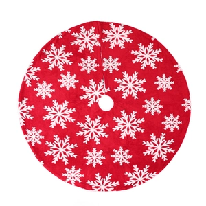 Red Christmas tree skirt with white snowflake patterns in soft plush jacquard fabric