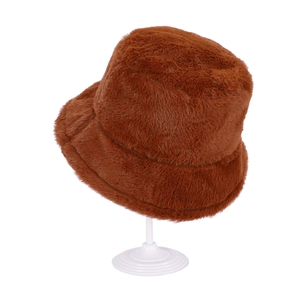 Close-up of thick brown faux fur bucket hat showing soft plush texture and warmth
