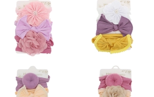 Detailed four-set display of baby nylon headbands with layered flowers and soft bows
