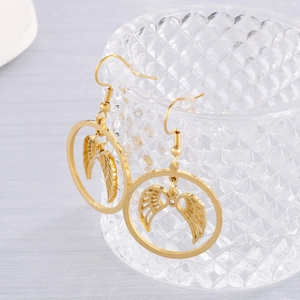 Polished gold stainless steel hollow round earrings with angel wing design on glass
