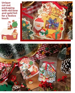 Détail de cartes de Noël avec nœuds en ruban rouge et motifs de fêtes dorés