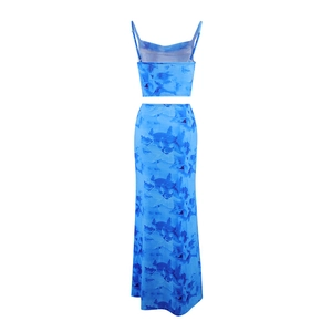 Rear view of women's two-piece set featuring blue abstract tie-dye print and slim fit