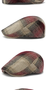 Close-up of vintage plaid beret featuring red and black herringbone tweed texture