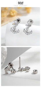 Macro view of anchor-shaped stud earring with cubic zirconia pavé and screw back detail