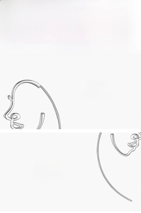 Close-up of polished S925 sterling silver earrings with abstract face outline design