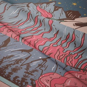 Detail of plush velvet tapestry fabric showing fine overlock edges and printed tarot art