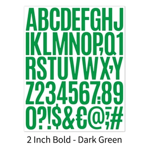 Macro view of 2-inch dark green bold letter and number stickers for journals