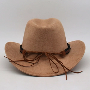 Detail of camel suede cowboy hat with thin leather band, metallic studs and bow tie