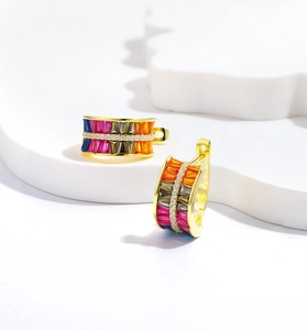 Detail view of double-row rainbow cubic zirconia inlays on gold-plated silver earrings