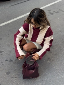 Women high neck knit sweater with red and white color block stripes and long sleeves