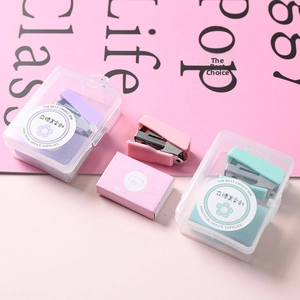Mini macaron-colored stapler set with purple, pink, and green office supplies with staples
