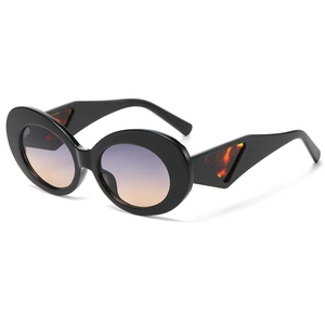 Modern oval cat-eye sunglasses with gradient lenses and triangle cutout temples