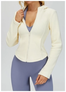 Detail of soft cream fleece texture and zipper on women's slim hooded jacket