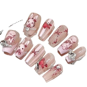 Handmade Rococo press-on nails with 3D rabbits, pink unicorn motifs and pearl accents