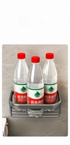 Strong load-bearing wall shelf in gunmetal grey aluminum with three water bottles