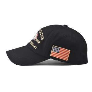 Detail of 3D eagle embroidery and flag patch on black cotton baseball cap