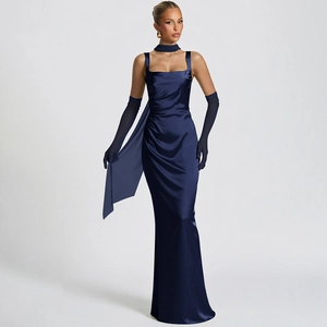 Detail of elegant dark blue satin slim-fit dress with matching long gloves and draping