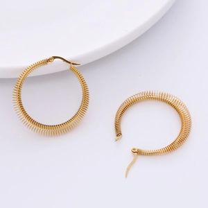 Eleganti orecchini a cerchio intrecciati dorati in acciaio con design a spirale