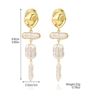 Baroque pearl long drop earrings with gold textured metal and dimensions shown