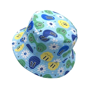Light blue bucket hat with daisy and smiley face prints for outdoor sun protection