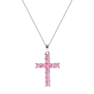 Detail of a pink square-cut zircon cross pendant with a delicate silver chain