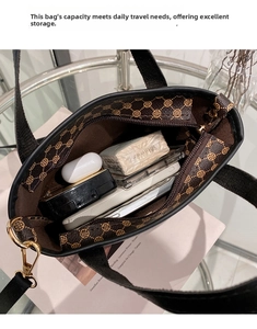 Top view of mini bucket bag interior showing capacity for phone and makeup accessories