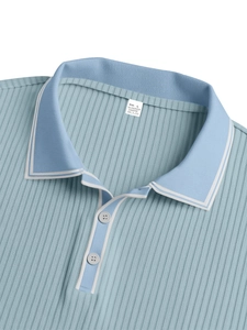 Macro shot of vertical striped fabric texture and buttons on a blue polo shirt collar