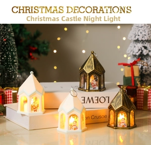 Detail of vintage Christmas lanterns with warm LED light and Santa Claus illustrations