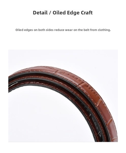 Macro detail of brown crocodile textured leather belt featuring smooth edge painting finish